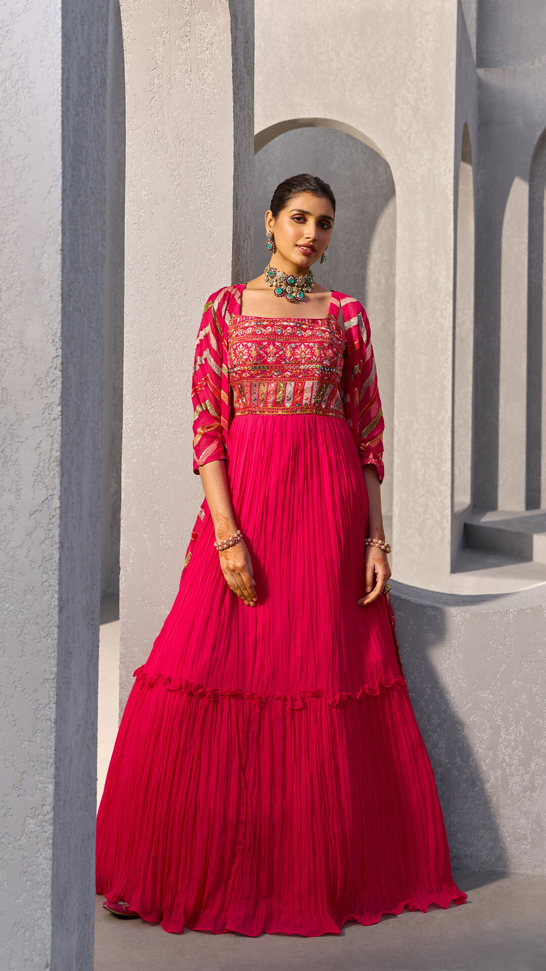 Bride looking radiant in a gorgeous red lehenga, perfect for a pre-wedding photoshoot